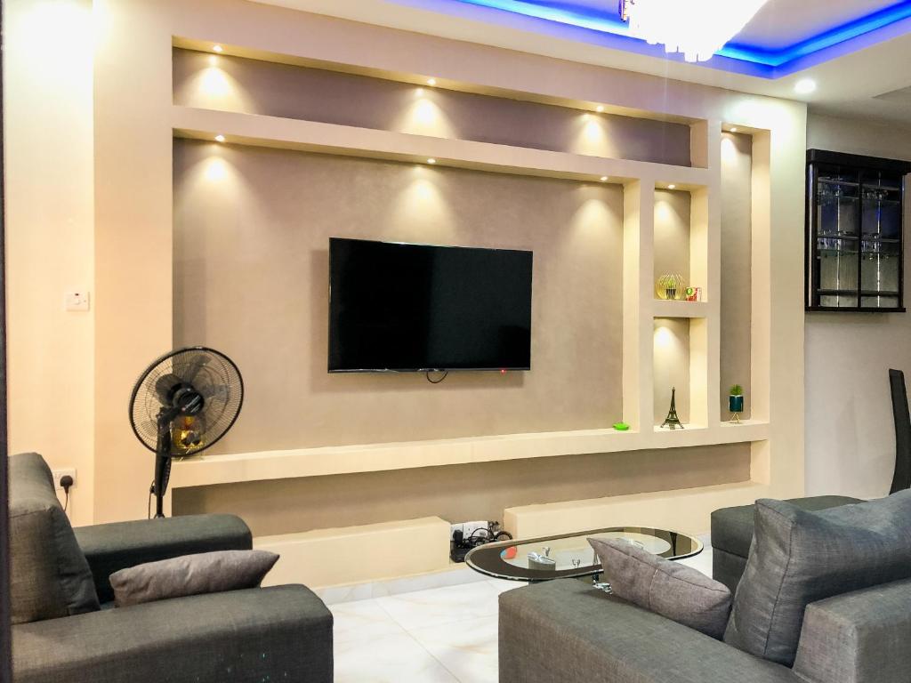 TV a/nebo společenská místnost v ubytování Crayford Homes