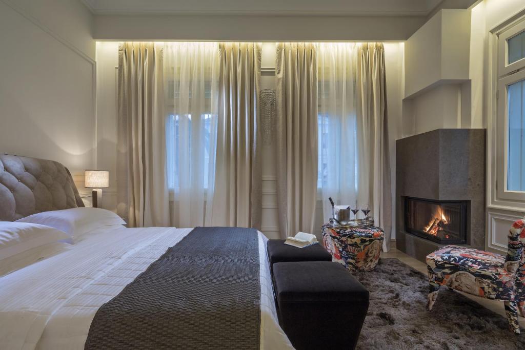 Postel nebo postele na pokoji v ubytování 3 Sixty Hotel & Suites