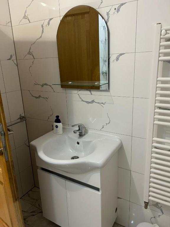 Koupelna v ubytování Pensiunea Giulia Home