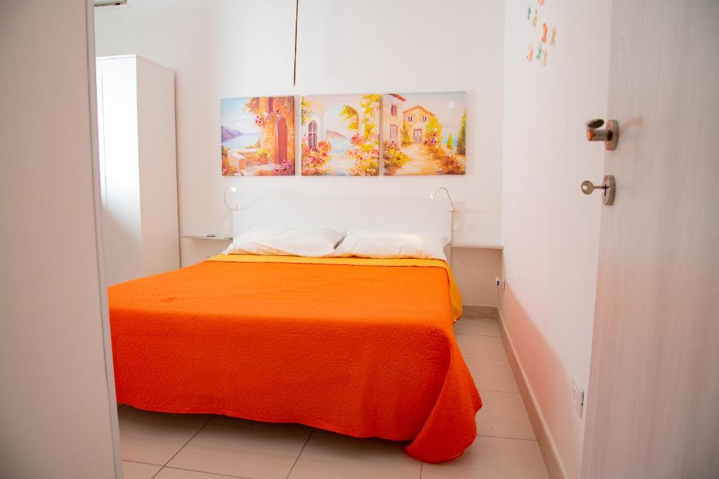 A bed or beds in a room at Casa Vacanze Nike