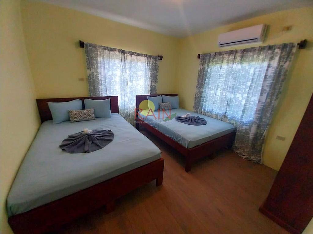 מיטה או מיטות בחדר ב-Highend resort