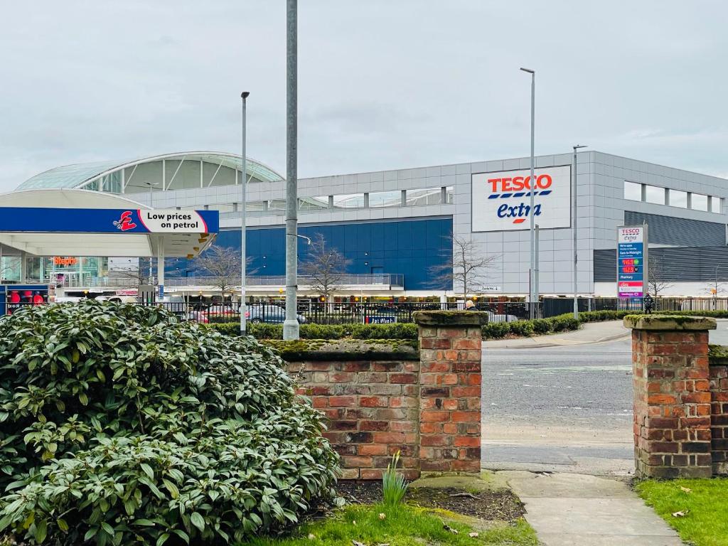 a tesco store with a sign in front of it at Two Double bedrooms apartment near Hull city centre in Hull