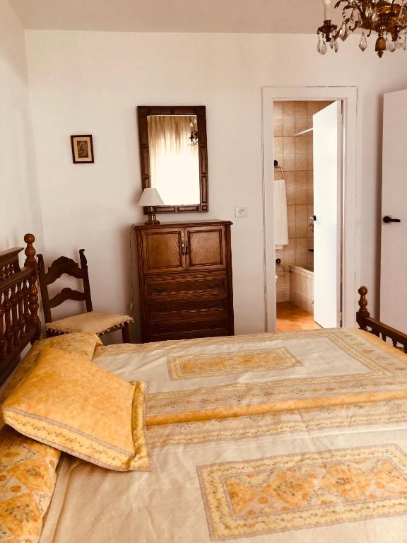 Postel nebo postele na pokoji v ubytování Vivienda Familiar en el Centro de Baeza