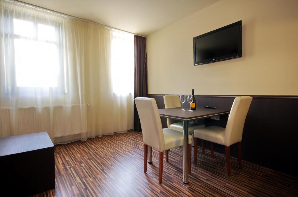 Telewizja i/lub zestaw kina domowego w obiekcie Corvin Apartman