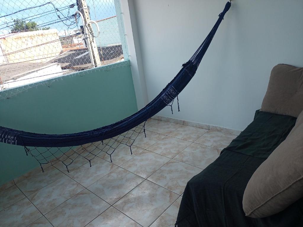 Et opholdsområde på Acomodação Pai eterno