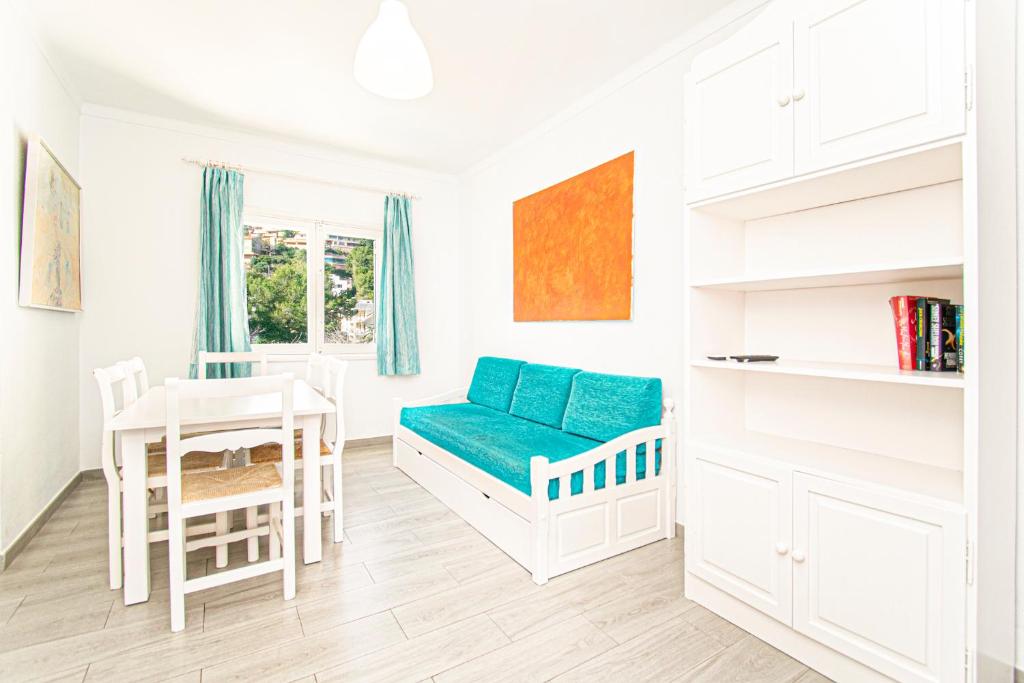 Posteľ alebo postele v izbe v ubytovaní Apartamentos Falcó