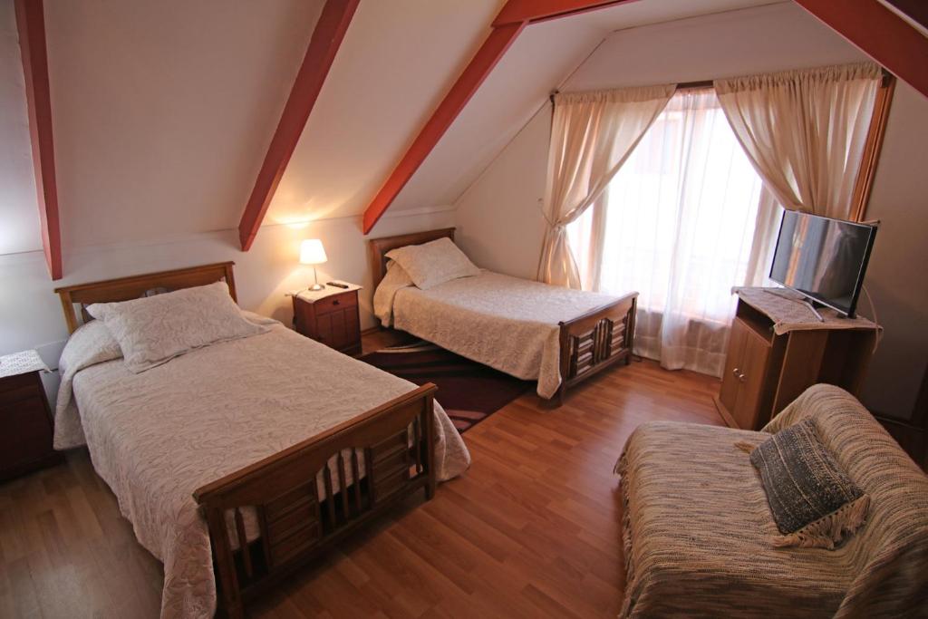 Postel nebo postele na pokoji v ubytování Casa Emiluz