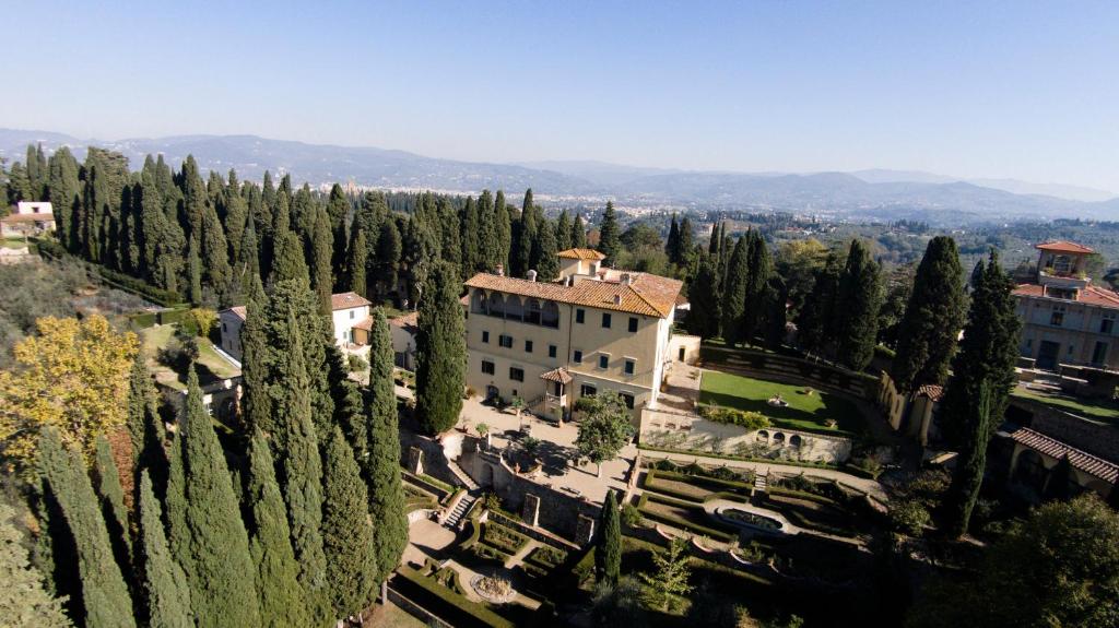 an aerial view of a building surrounded by trees at Art Hotel Villa Agape in Florence