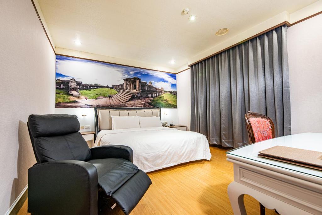 Postel nebo postele na pokoji v ubytování Wenpin Hotel - Pier 2