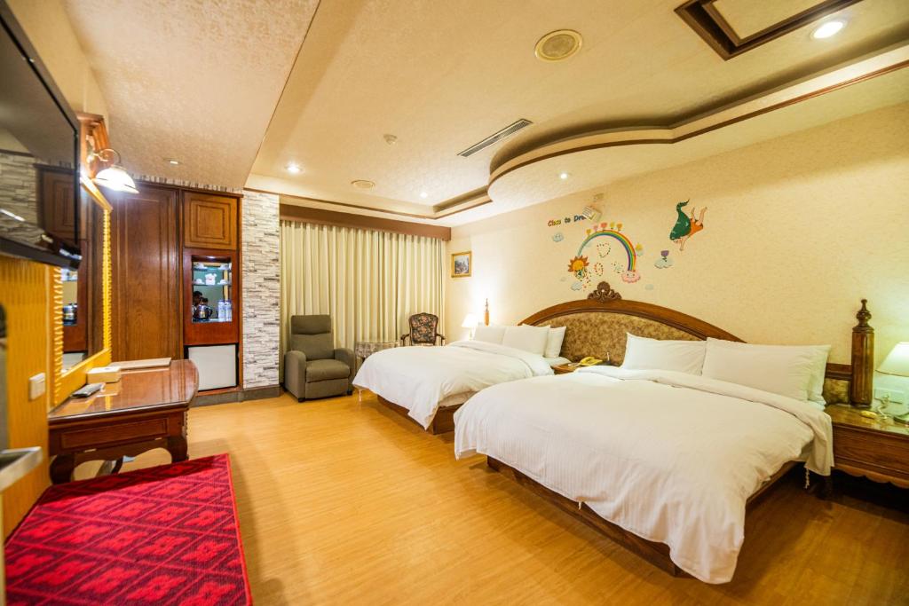 Postel nebo postele na pokoji v ubytování Wenpin Hotel - Pier 2