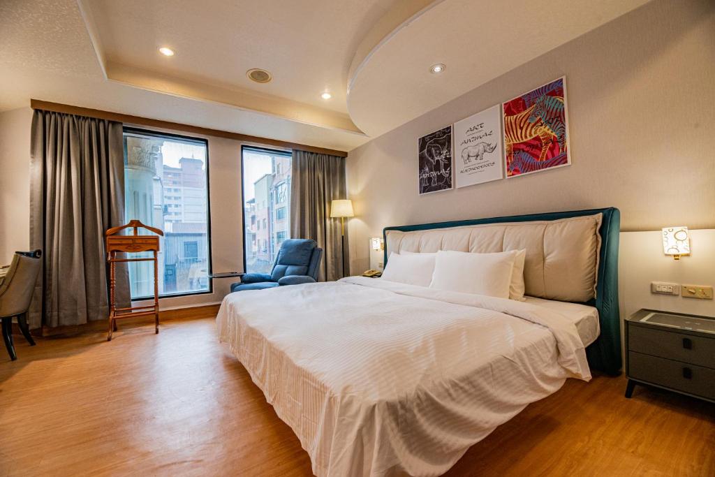 Postel nebo postele na pokoji v ubytování Wenpin Hotel - Pier 2