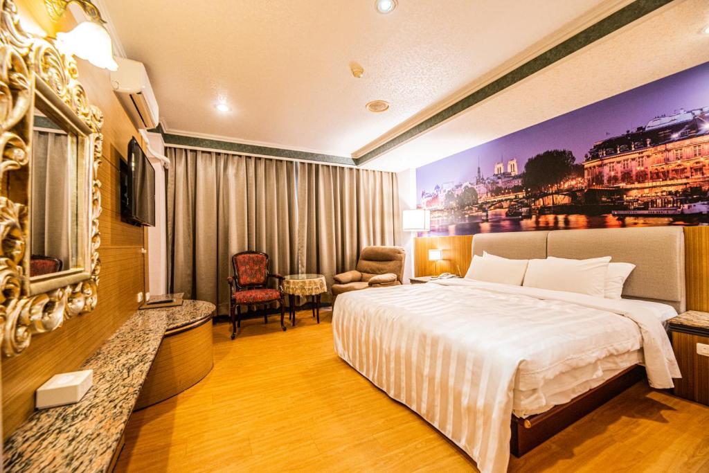 Postel nebo postele na pokoji v ubytování Wenpin Hotel - Pier 2