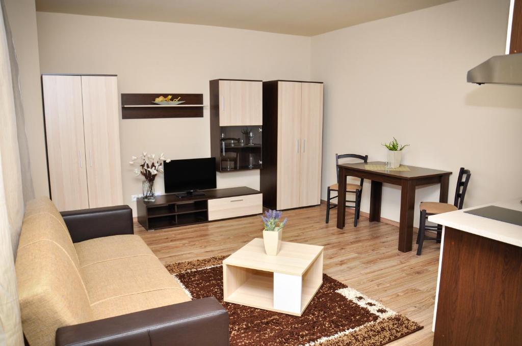 A kitchen or kitchenette at Apartmany Fonte