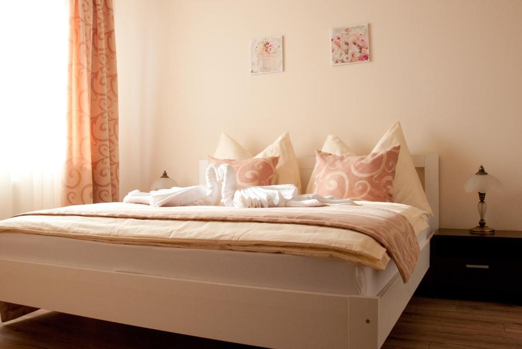 A bed or beds in a room at Apartmany Fonte