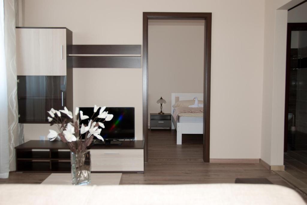 A bed or beds in a room at Apartmany Fonte