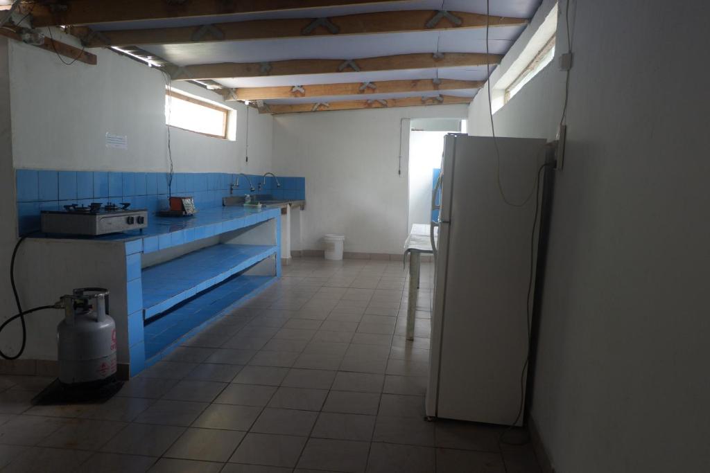 Kuchyň nebo kuchyňský kout v ubytování Bluepango Guest House