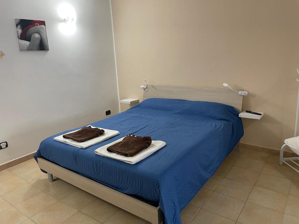 Giường trong phòng chung tại Blanda house