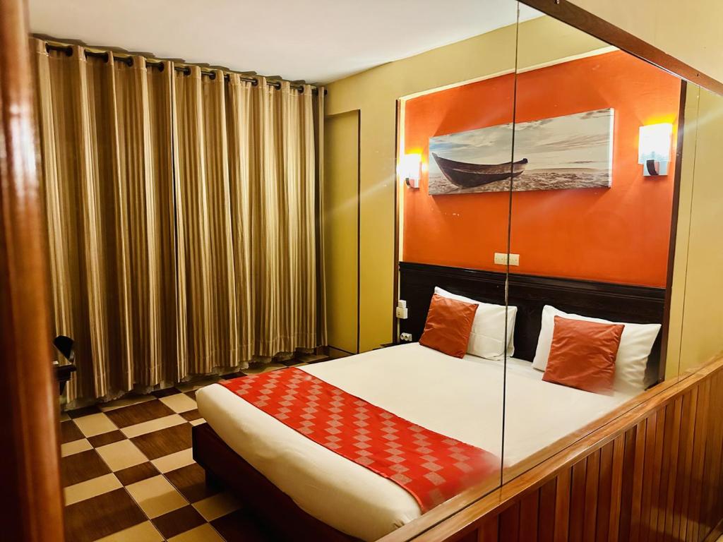 Кровать или кровати в номере Yaahot