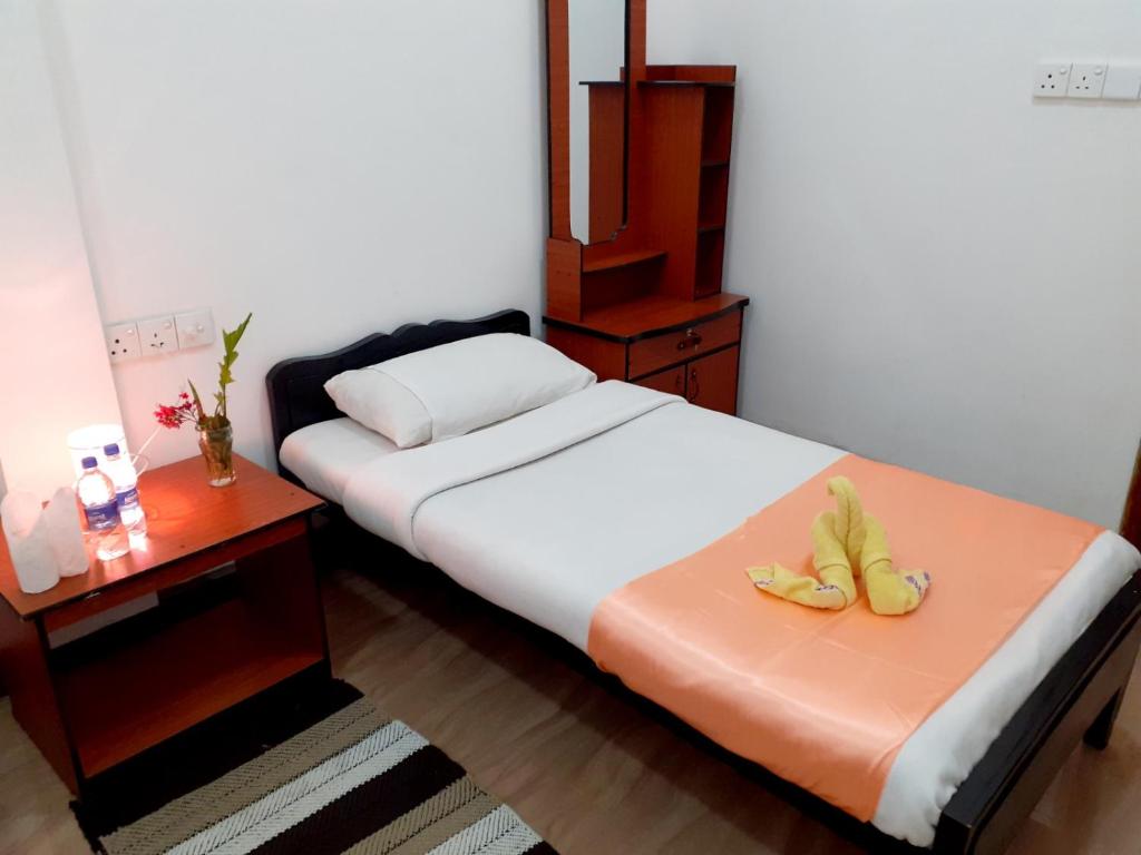 Postel nebo postele na pokoji v ubytování Subash Hotel