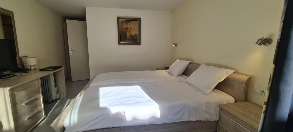 Postel nebo postele na pokoji v ubytování Alliance Hotel Ieper Centrum