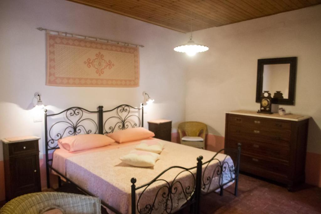 A bed or beds in a room at B&B Casa Licheri