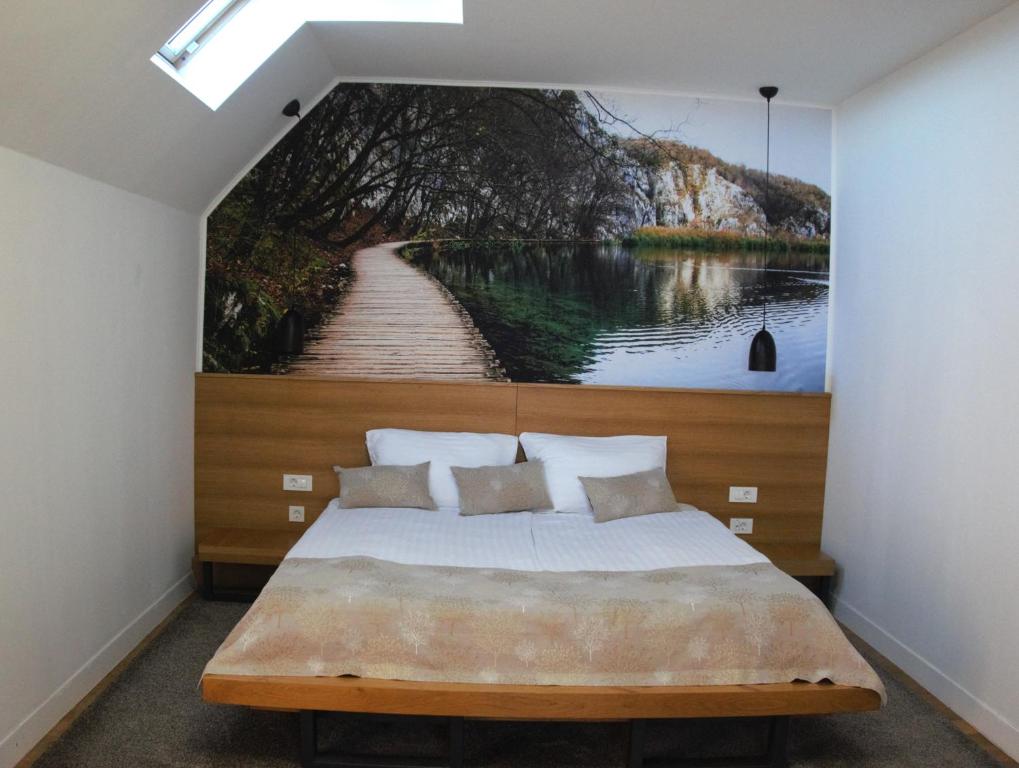 Posteľ alebo postele v izbe v ubytovaní Hotel Palcich Plitvice