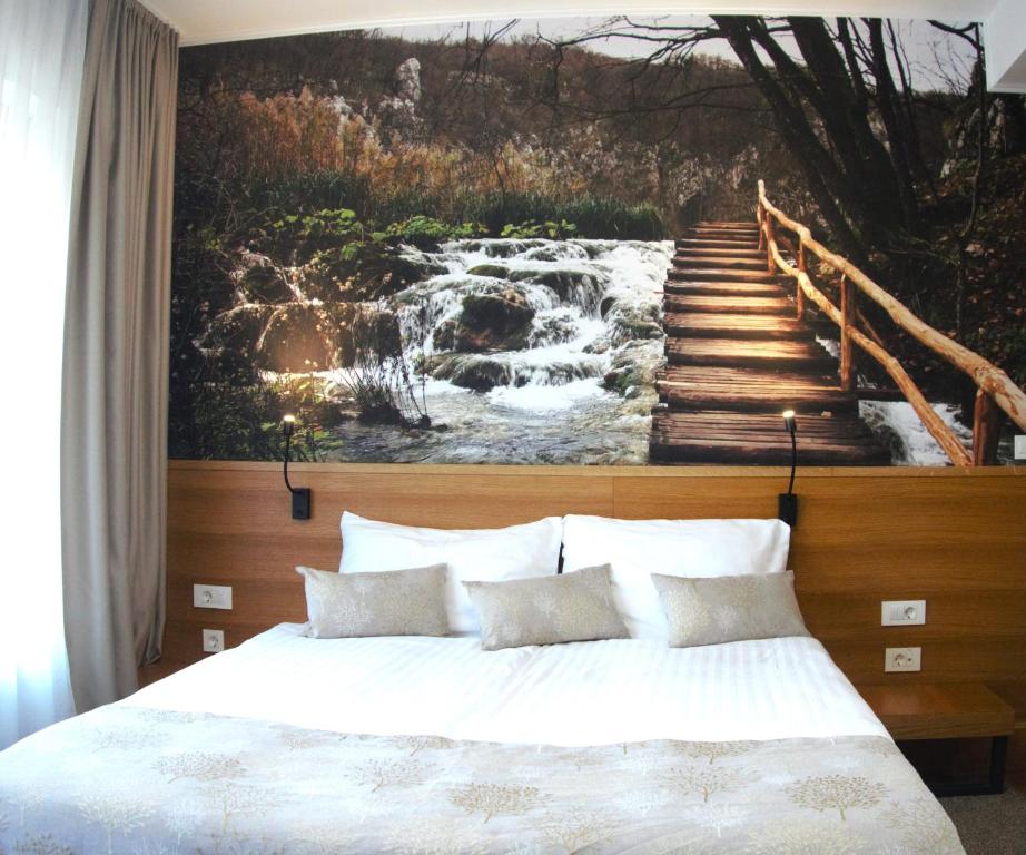 Posteľ alebo postele v izbe v ubytovaní Hotel Palcich Plitvice