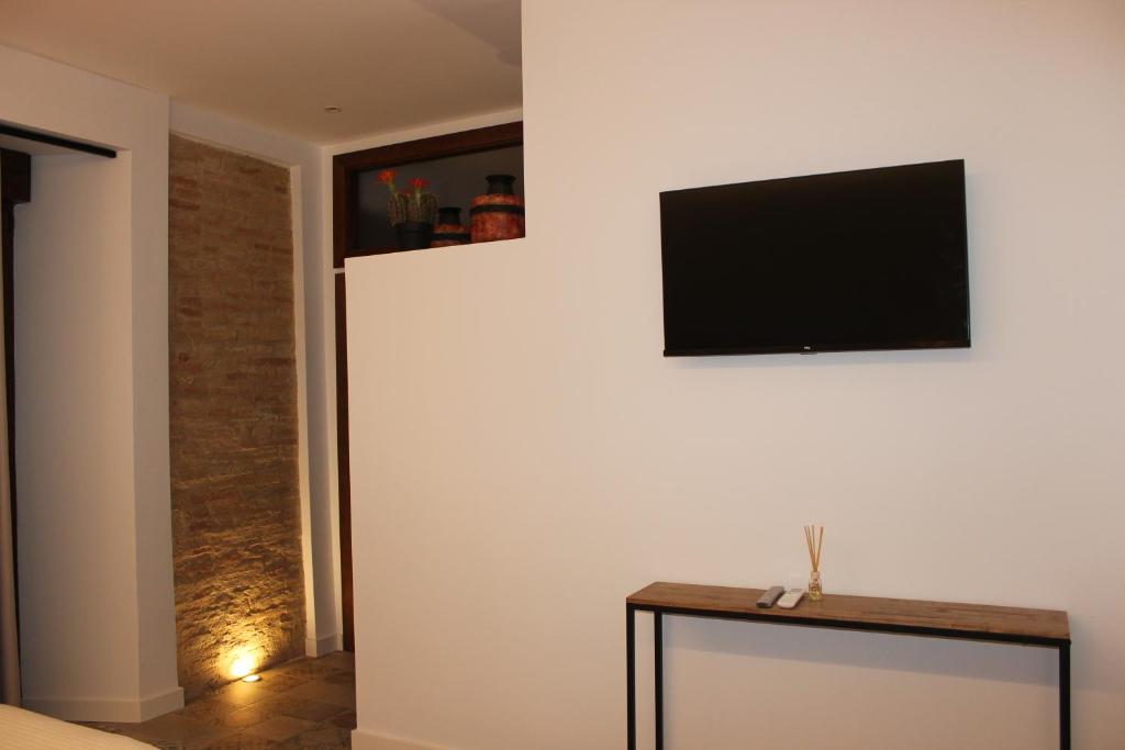 TV a/nebo společenská místnost v ubytování SUITE DEL CASTILLO
