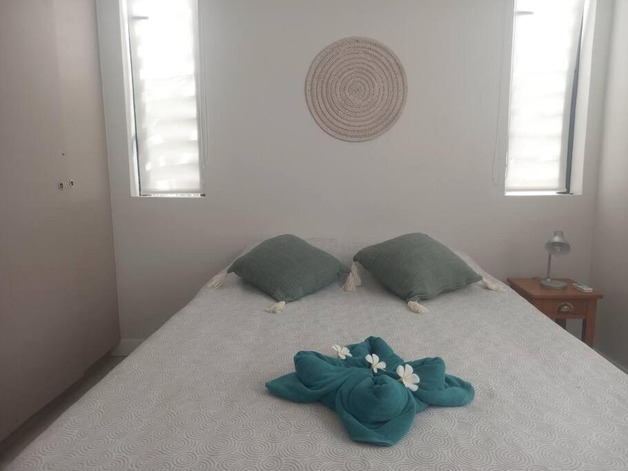 Postel nebo postele na pokoji v ubytování Beachfront Apartment