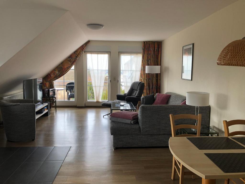 Posezení v ubytování Ferienwohnung "Kranich" im Ferien-Resort Rügen