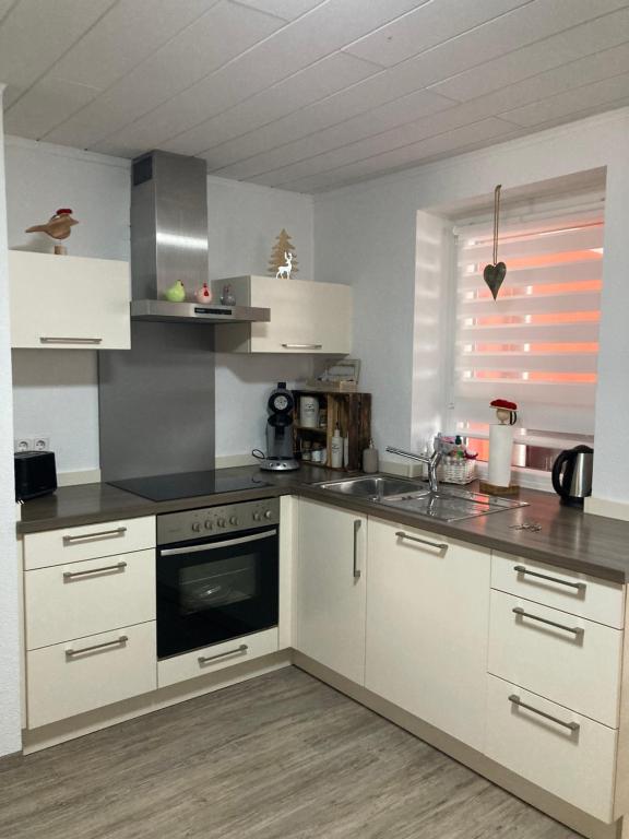 Kuchyň nebo kuchyňský kout v ubytování Ferienwohnung Petra