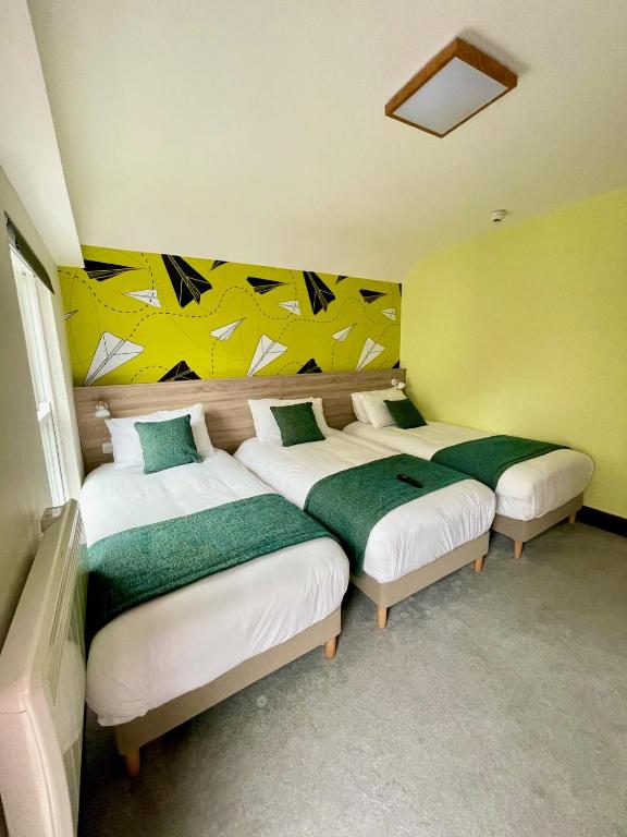 Cama ou camas em um quarto em The Norseman Temple Bar