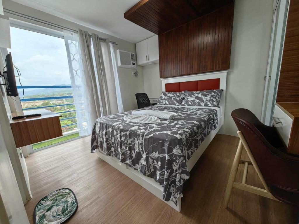 Postel nebo postele na pokoji v ubytování 2 BR Loop Tower 1524