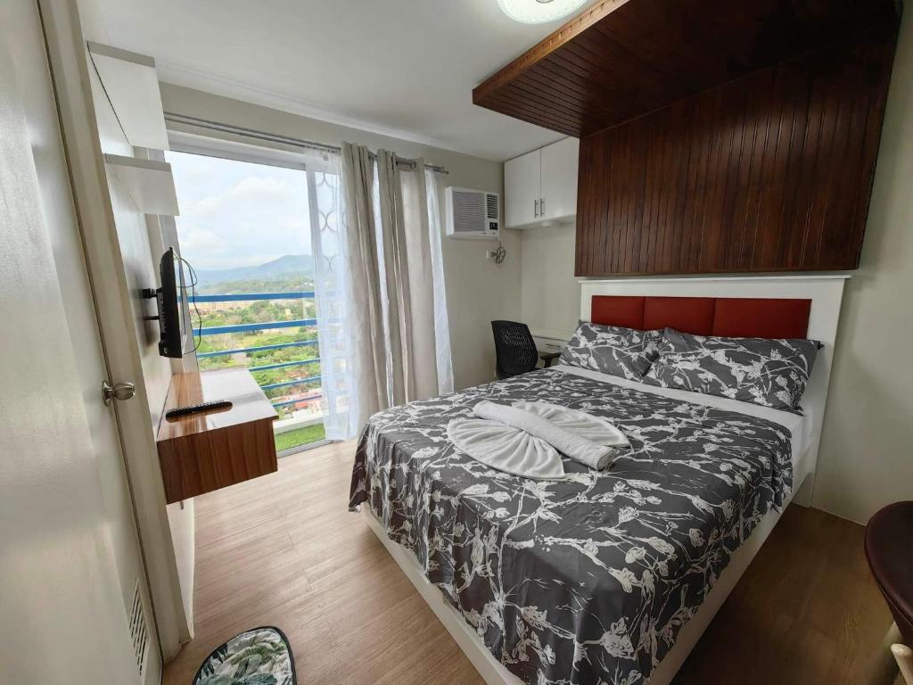 Postel nebo postele na pokoji v ubytování 2 BR Loop Tower 1524