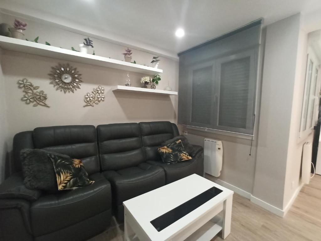 A seating area at Apartamento de Colón