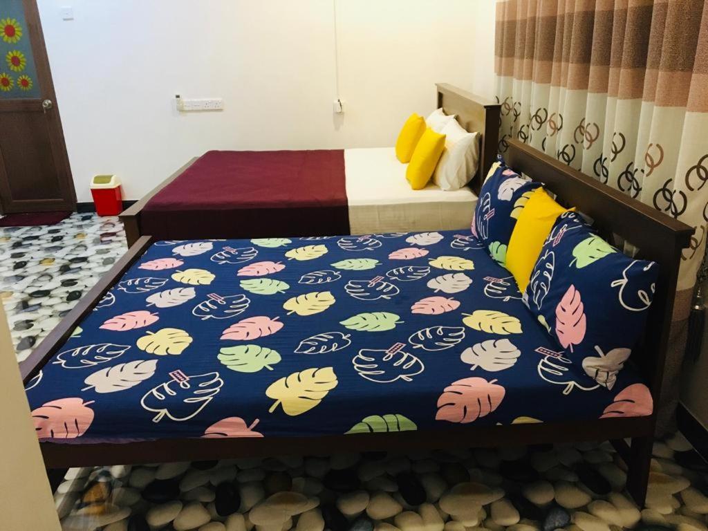 Postel nebo postele na pokoji v ubytování Vihanga Resort