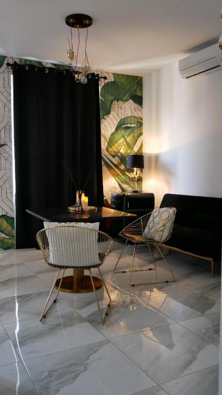 Posezení v ubytování AN Deluxe Suites