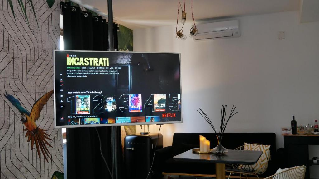 TV a/nebo společenská místnost v ubytování AN Deluxe Suites