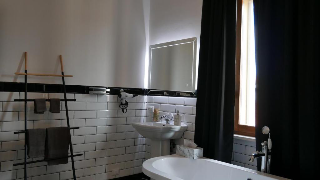 Koupelna v ubytování AN Deluxe Suites