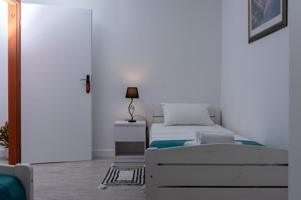 Posteľ alebo postele v izbe v ubytovaní Blue Mile Apartman Split
