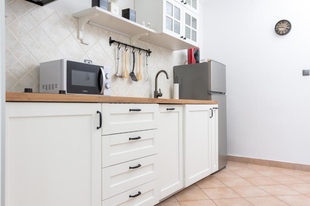 Kuchyňa alebo kuchynka v ubytovaní Blue Mile Apartman Split