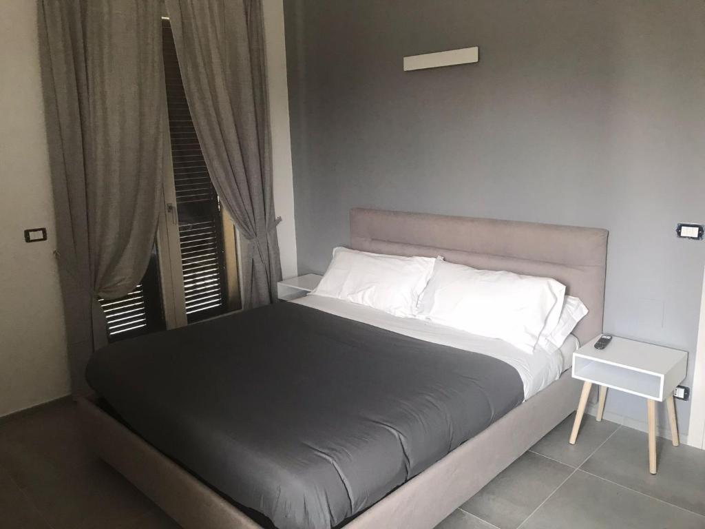 Postel nebo postele na pokoji v ubytování La Casa in Rivalta