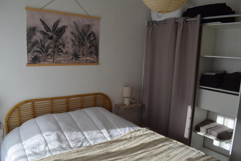 Posteľ alebo postele v izbe v ubytovaní Côte et Vie - appartement et garage