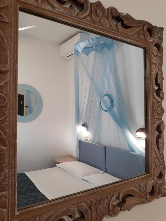 Postel nebo postele na pokoji v ubytování Hotel Smart Cervia B&B