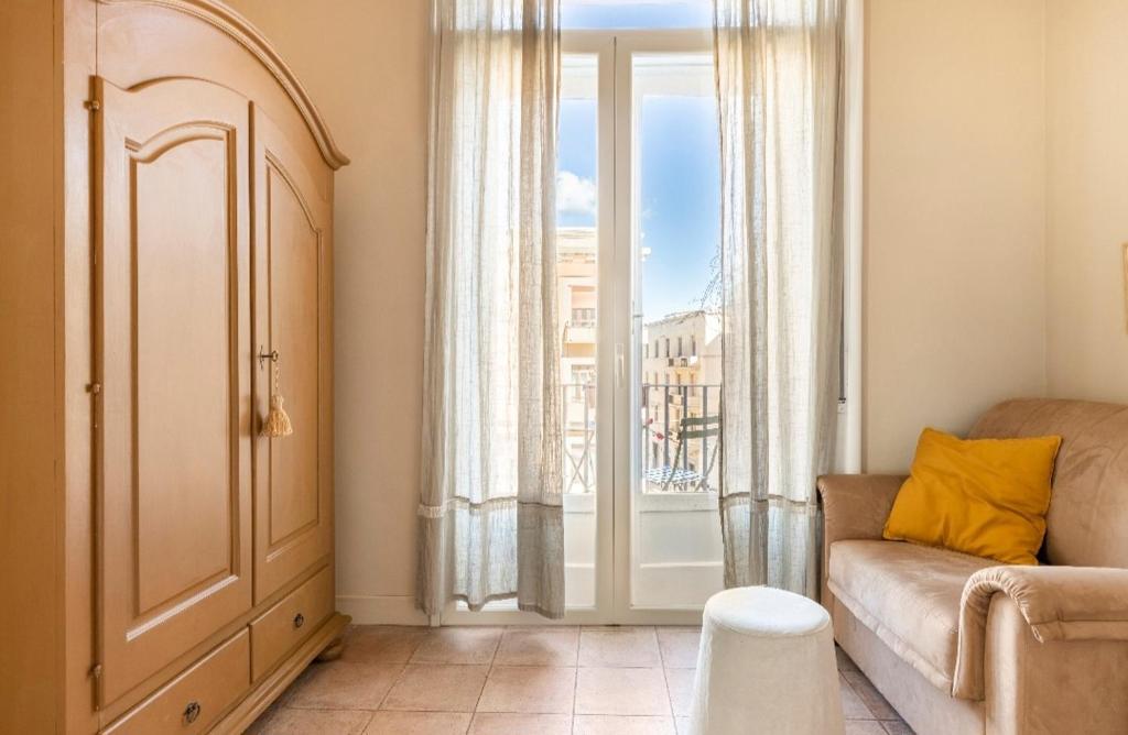 Posezení v ubytování Joy's Bnb Ortigia