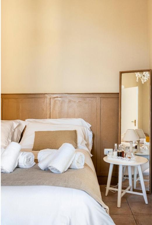 Postel nebo postele na pokoji v ubytování Joy's Bnb Ortigia