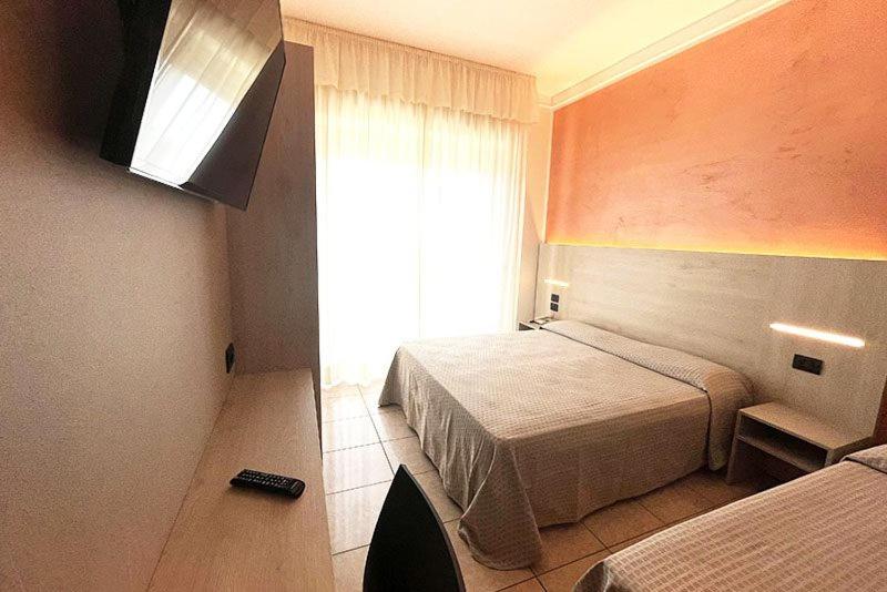 Postel nebo postele na pokoji v ubytování Hotel Everest