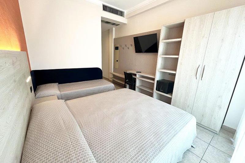 Postel nebo postele na pokoji v ubytování Hotel Everest
