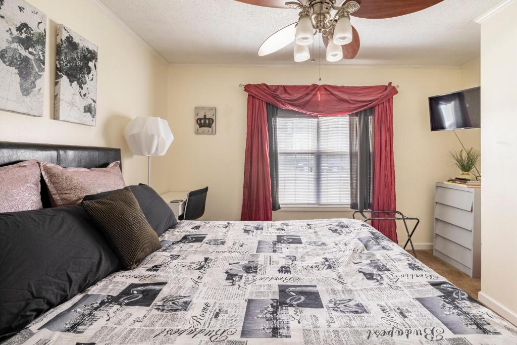 a bedroom with a bed and a window at Contemporary Paradise w/ Private Bathroom in Nashville