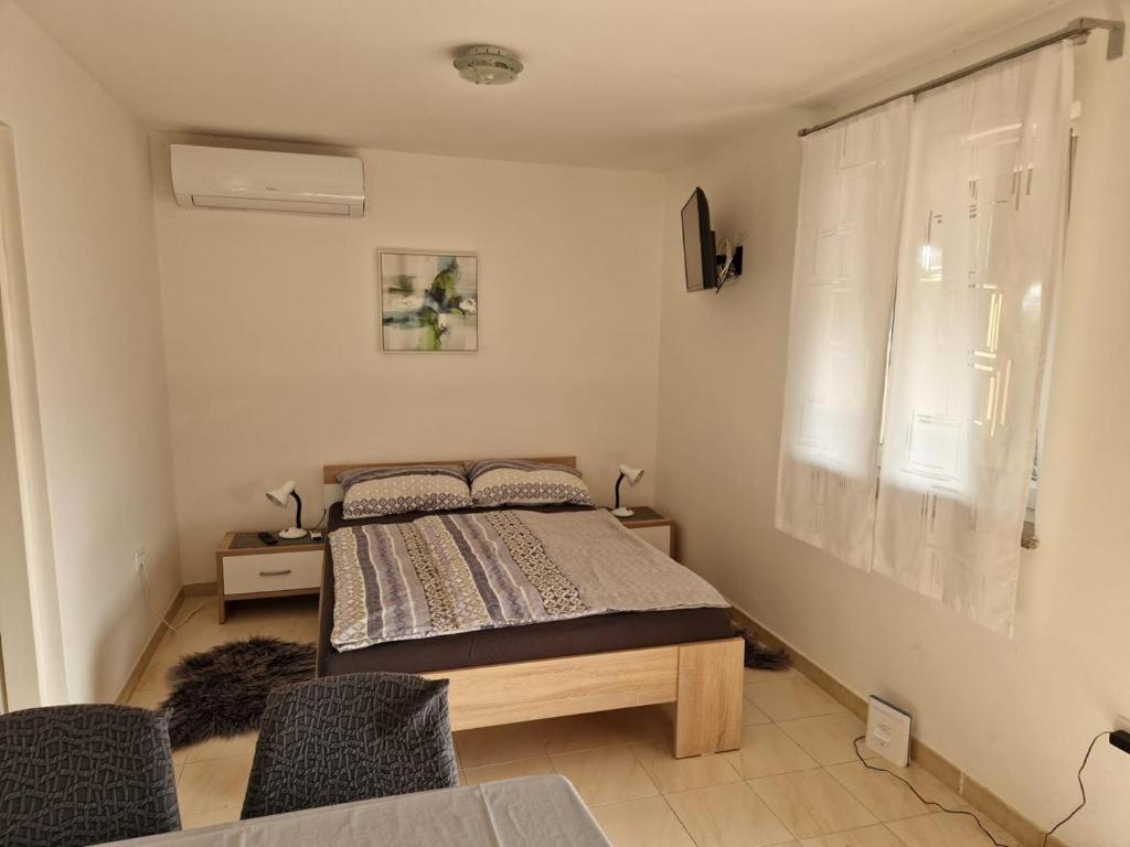 Postel nebo postele na pokoji v ubytování Lavendula